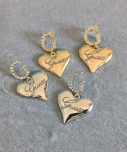 Aretes colgantes de metal con corazón moderno para mujer