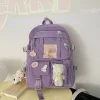 Mochilas populares para colegialas de color rosa y morado