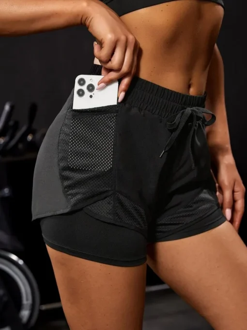 Pantalones deportivos elásticos con bolsillos para mujer