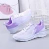 Zapatillas deportivas casuales ligeras de punto de malla voladoras de primavera para mujer