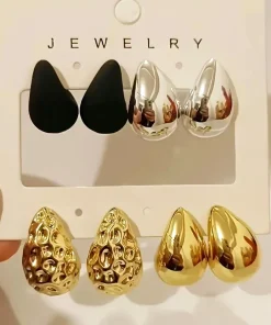 Aretes de perla de metal grueso brillante y clásico