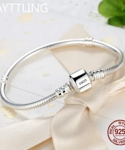 Brazalete con dijes de plata de ley 925