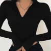 Camiseta lisa casual de manga larga y cuello vuelto para mujer