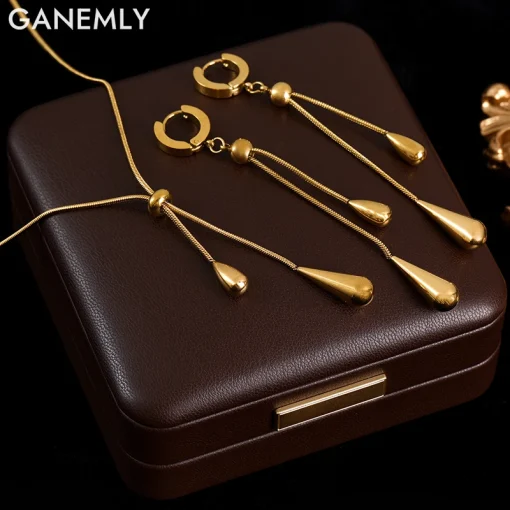 Conjunto de aretes y collar con borlas en forma de lágrima en acero inoxidable 316L con color dorado GANEMLY