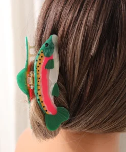 Pinza para el cabello navideña con carita sonriente