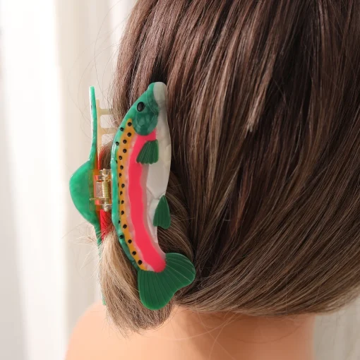 Pinza para el cabello navideña con carita sonriente