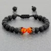 Pulsera ajustable hecha a mano con corona de piedra de lava negra, cuentas de ojo de tigre