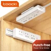 Sujetacables enchufes de pared Toocki