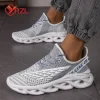 Zapatillas de running blancas transpirables